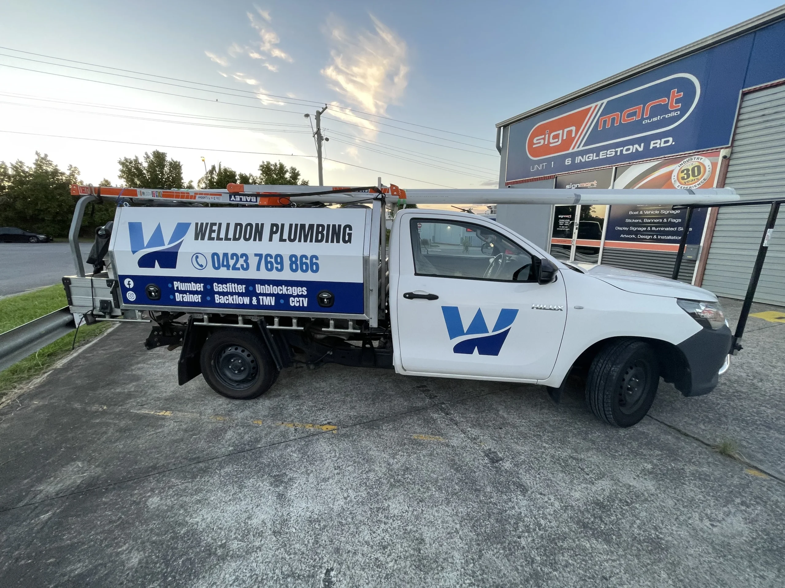 Brisbane Hot Water System Plumber 6 Welldon Plumbing ute on the road in Brisbane